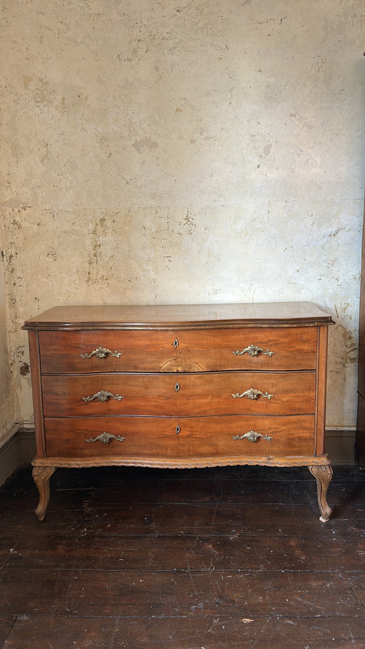 Antique French serpentine chest of drawers