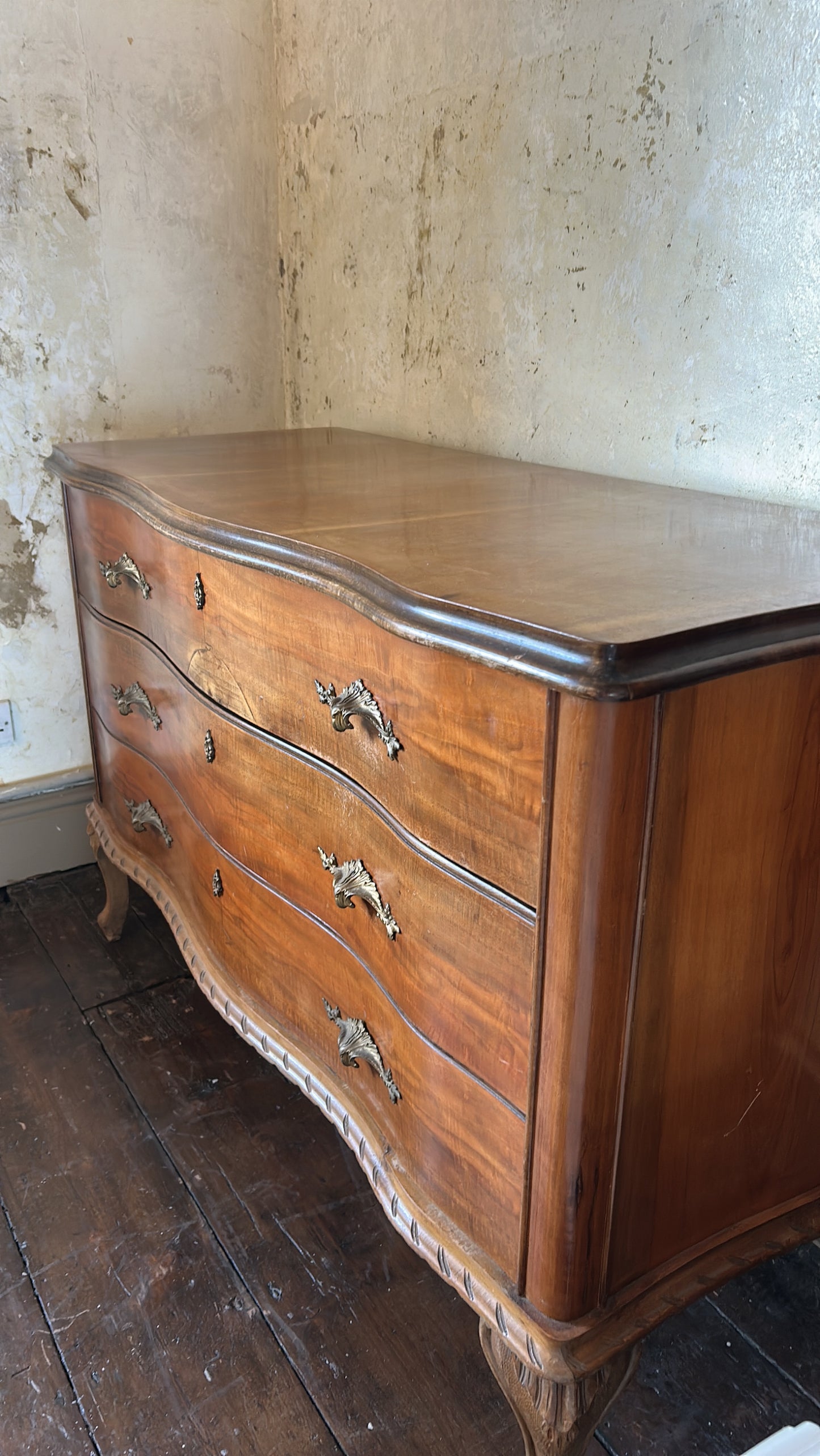 Antique French serpentine chest of drawers