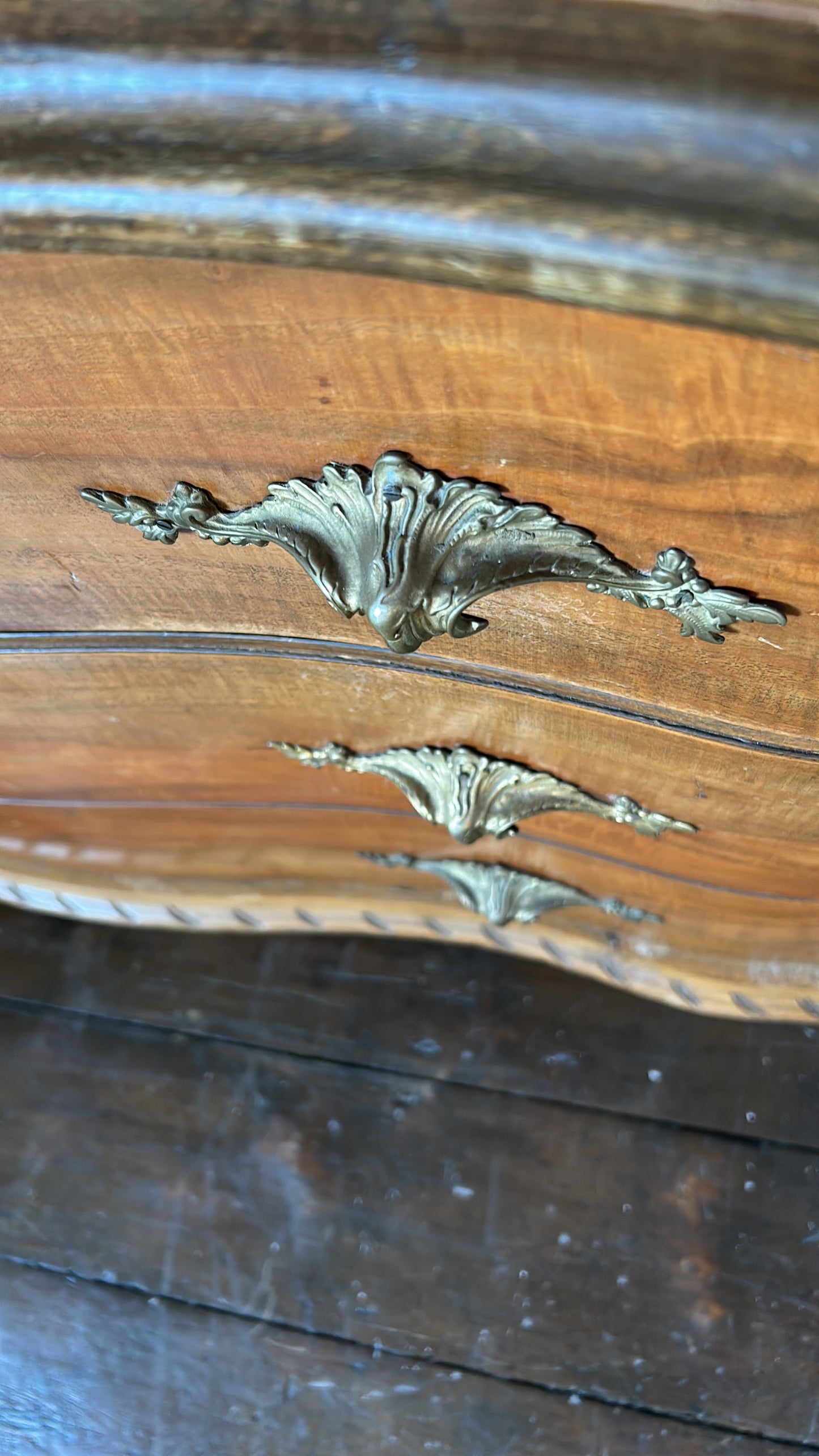 Antique French serpentine chest of drawers