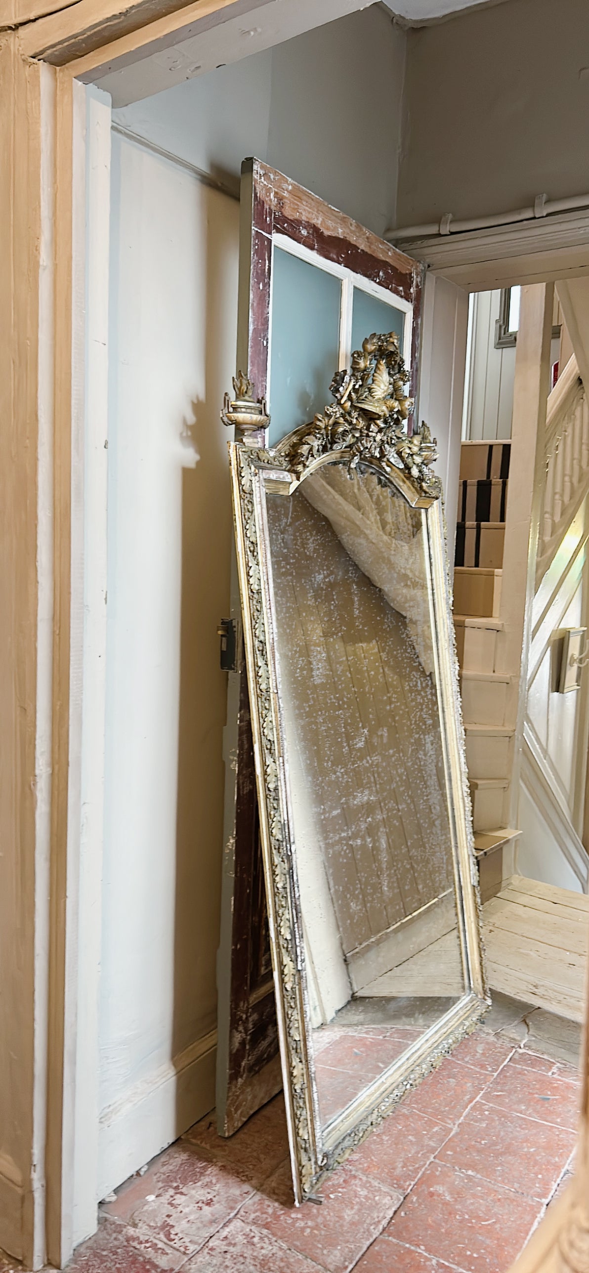 Large gold antique French mirror with ornate detailing & foxed mirror glass