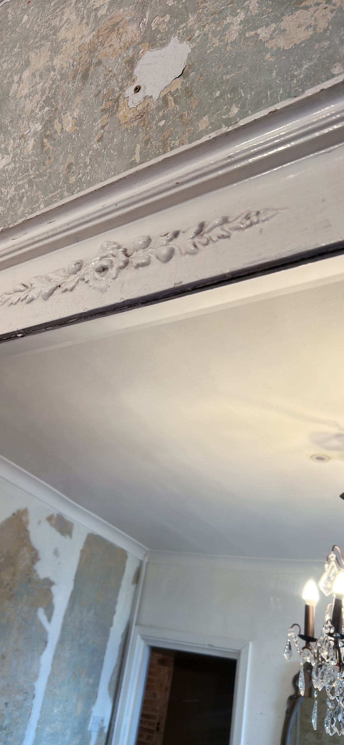 Antique painted mantel mirror with bevelled edged mirrored glass.