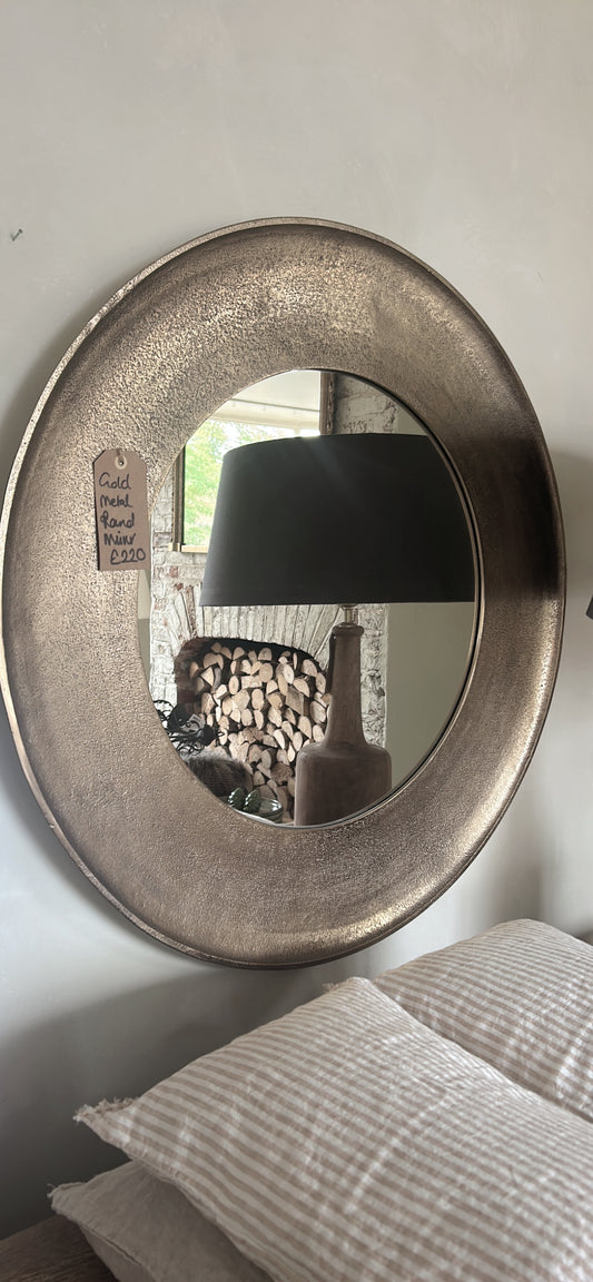 Hammered gold round mirror