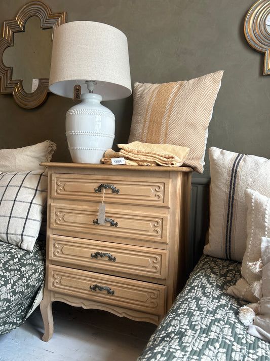Sandblasted petite French chest of drawers .