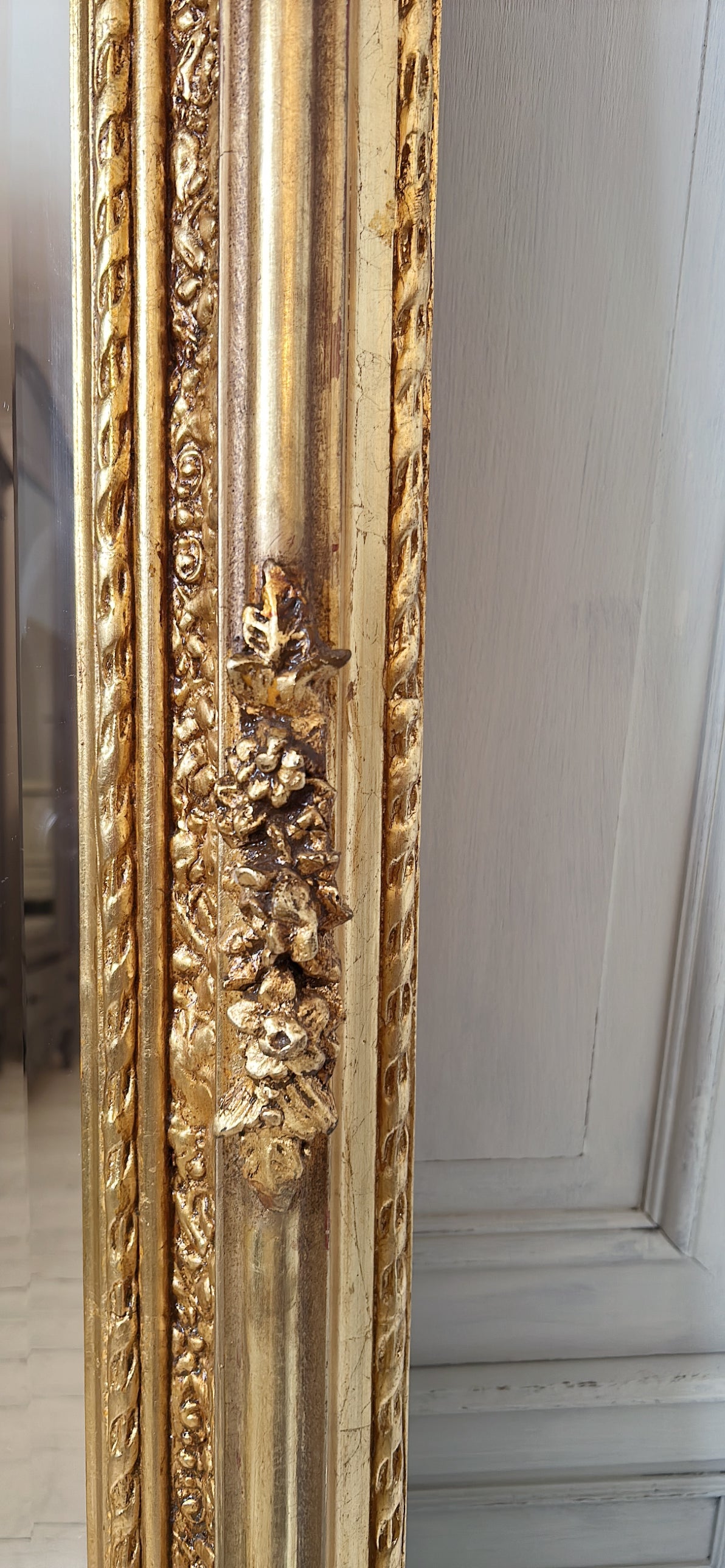 Ornate cherub gold mirror