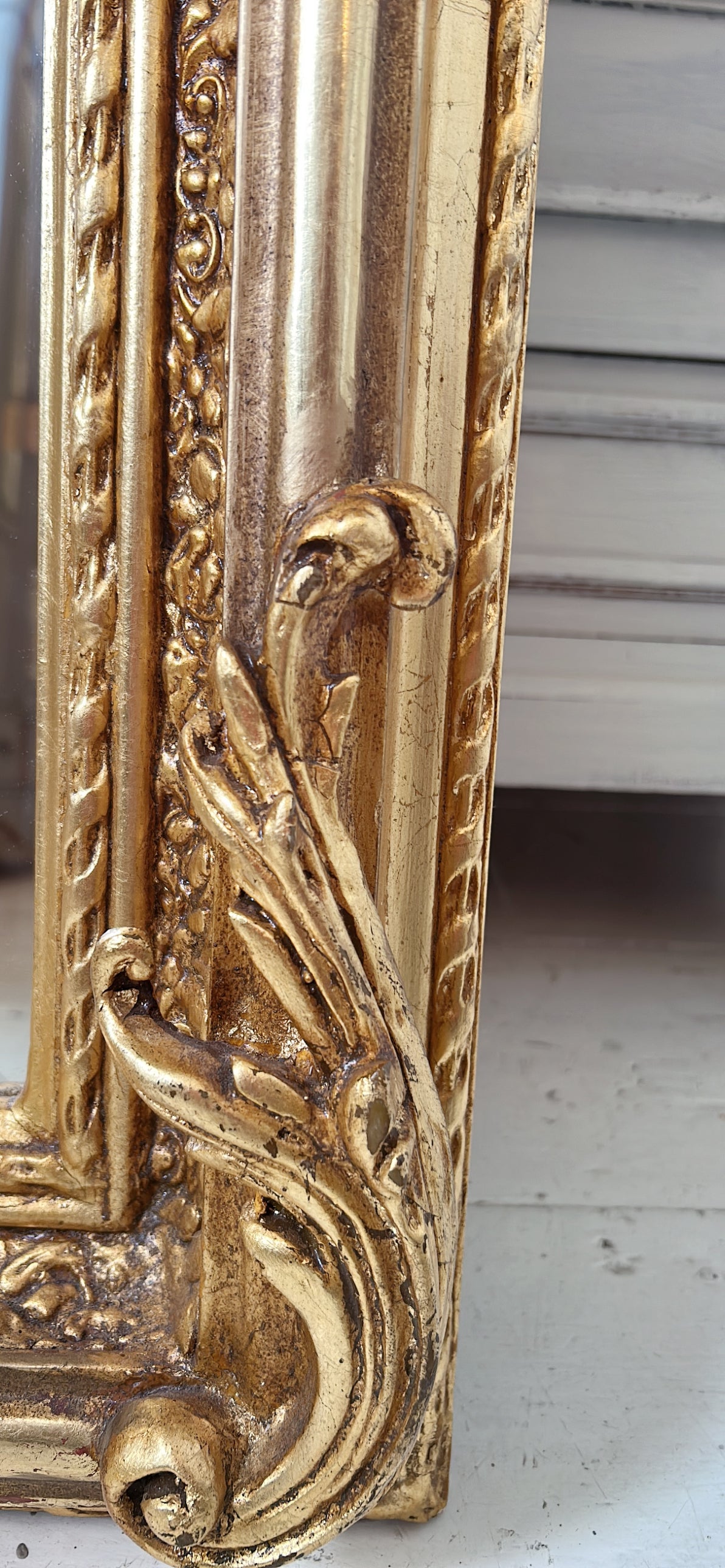 Ornate cherub gold mirror
