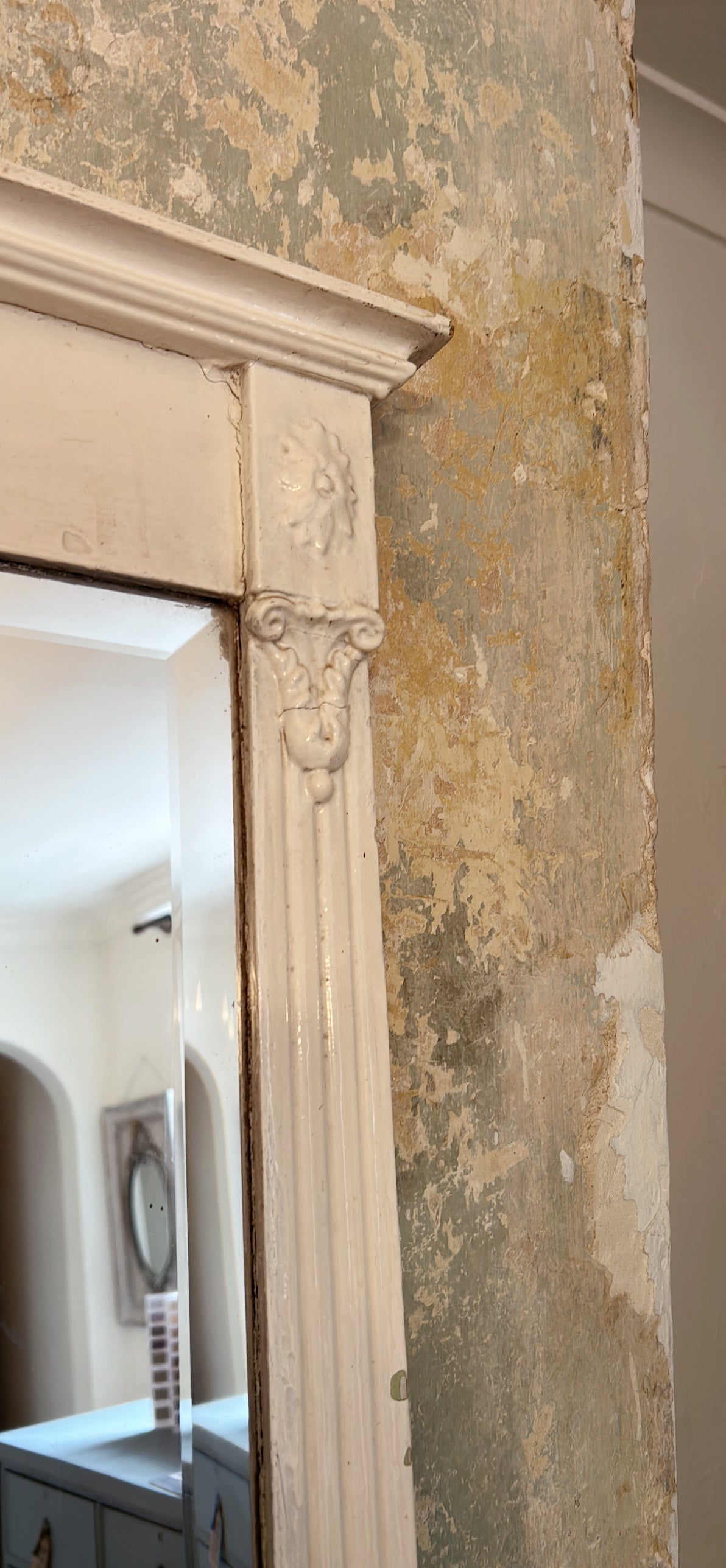 Antique painted mantel mirror with bevelled edged mirrored glass.