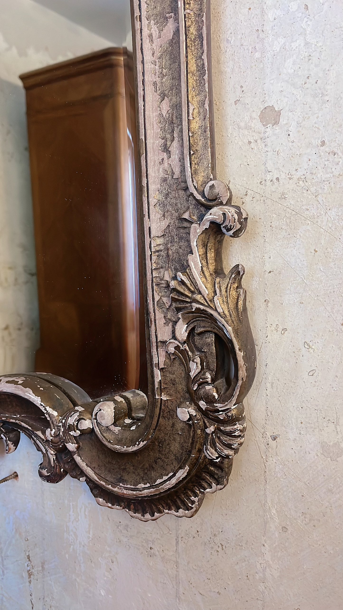 Ornate antique gold mirror