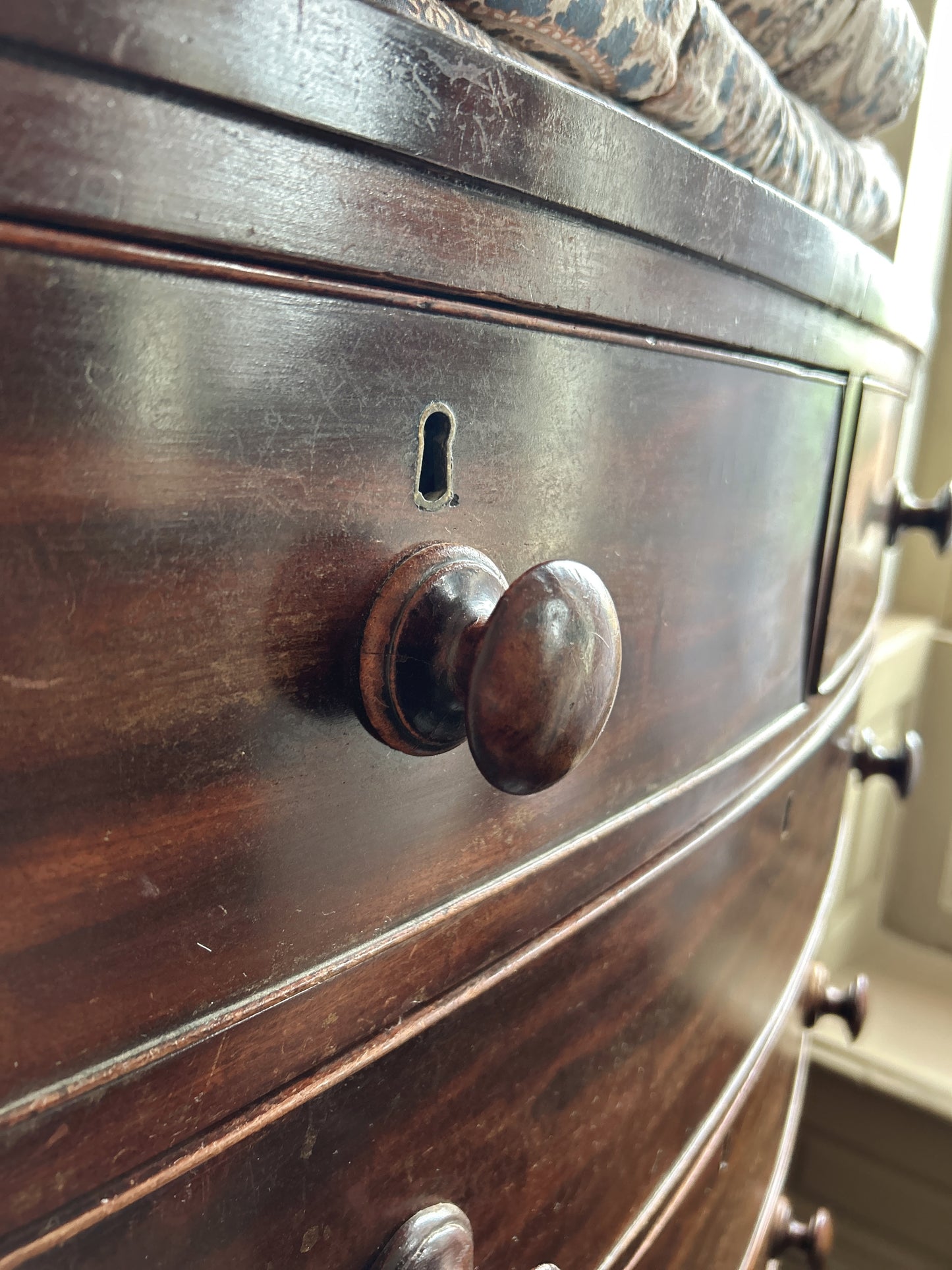 Antique Mahogany bow font chest of drawers